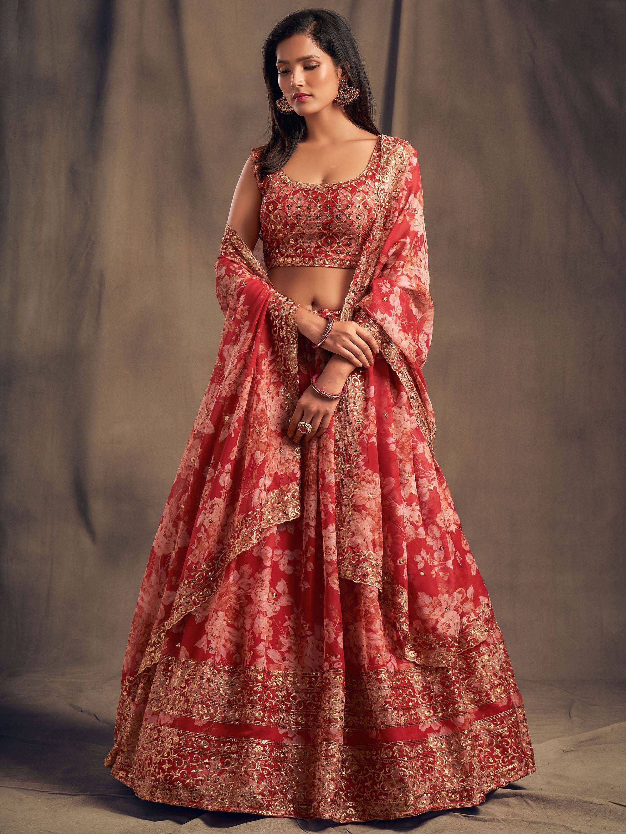 Red floral lehenga choli with gold embroidery, perfect for Indian weddings and festive occasions