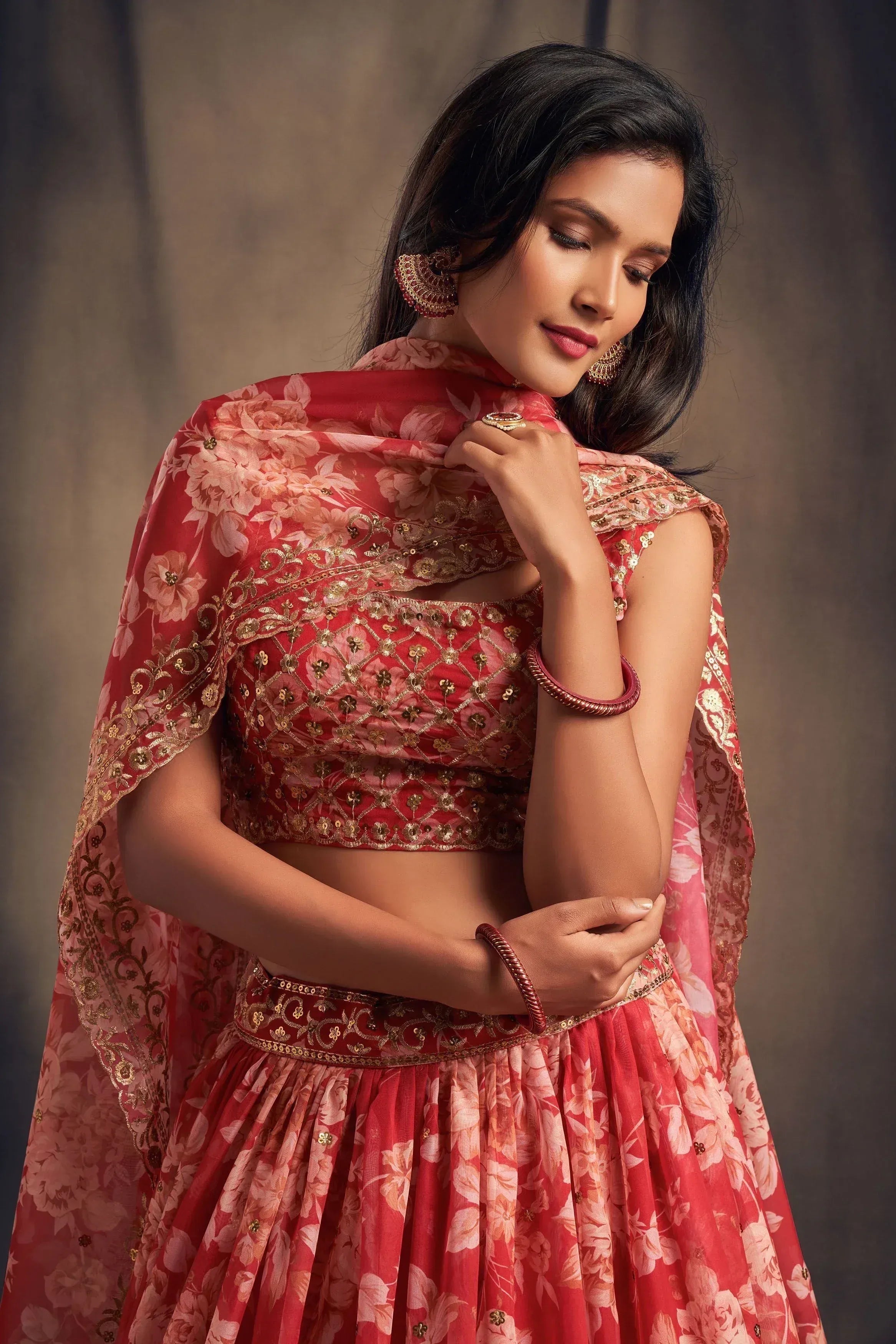 Red floral lehenga choli with gold embroidery, perfect for Indian ethnic wear occasions