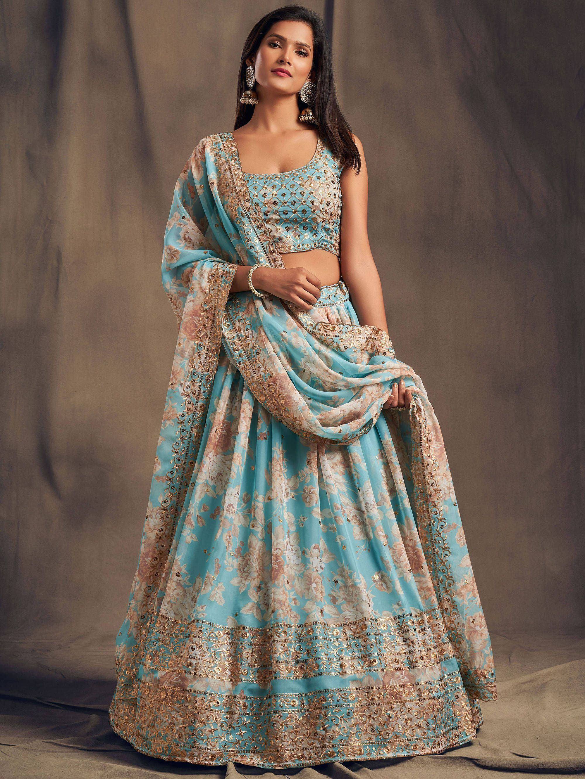 Light blue floral lehenga choli with gold embroidery, perfect for Indian weddings and festive occasions