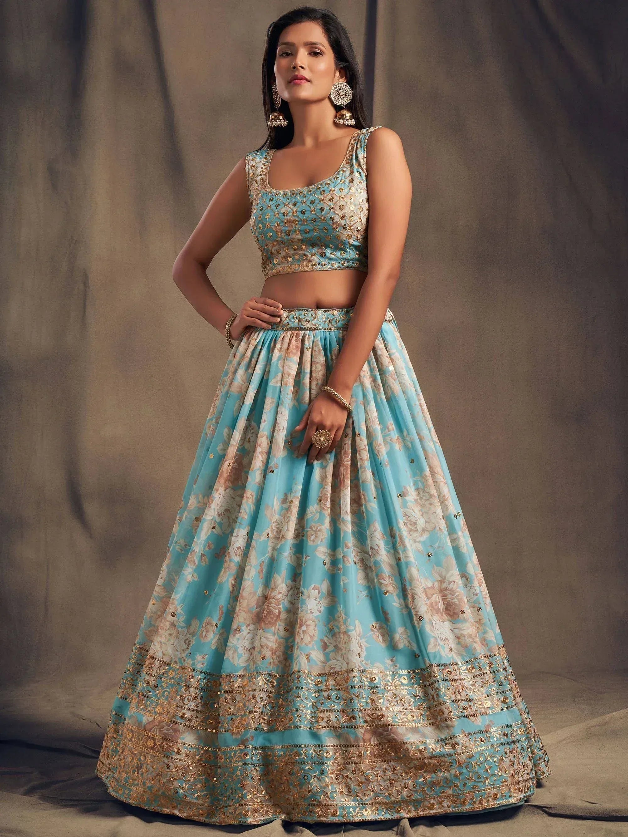 Blue floral lehenga choli with gold embroidery, perfect for Indian ethnic wear and festive occasions.