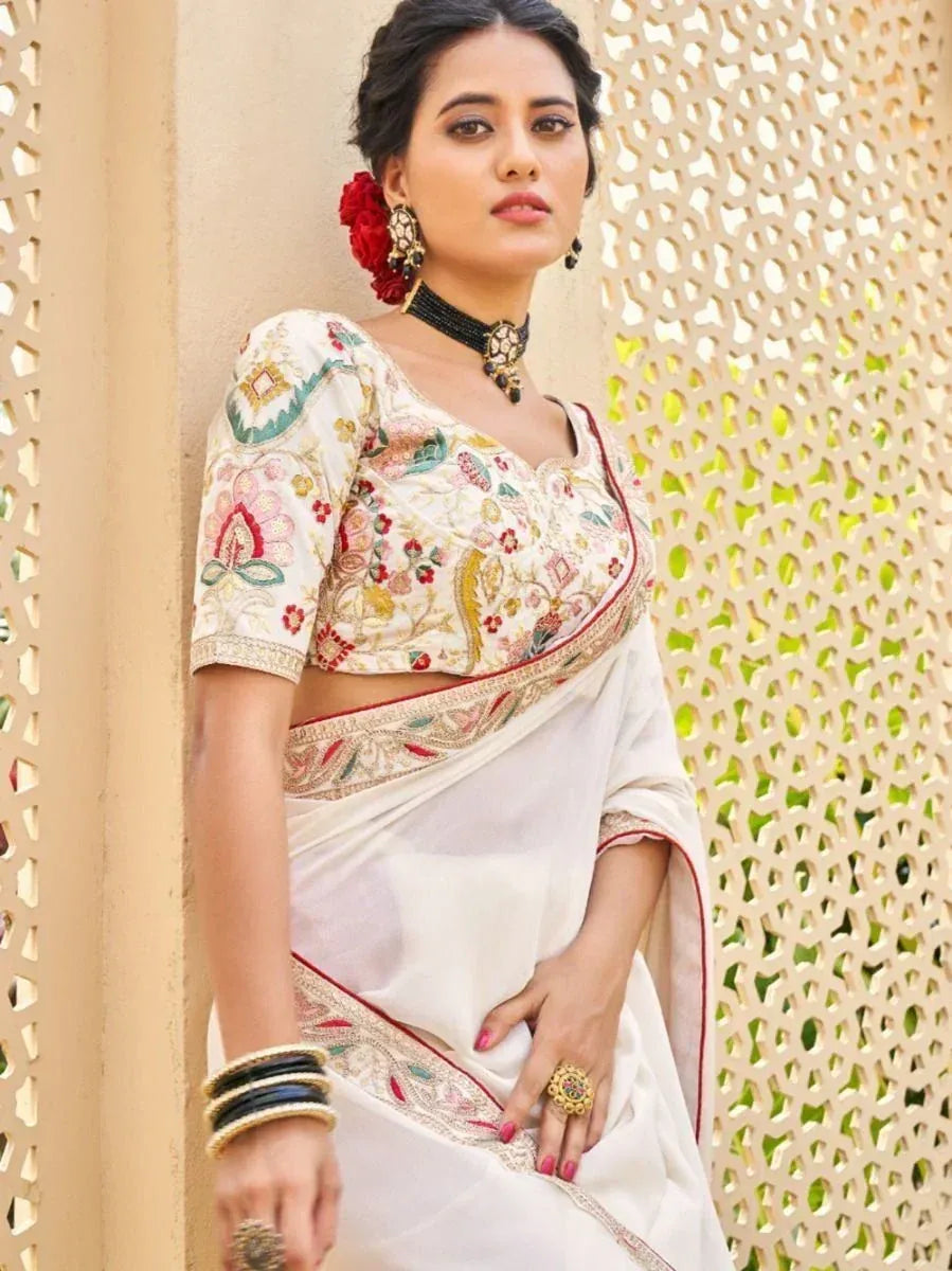 White embroidered saree with floral blouse, traditional Indian ethnic wear for women