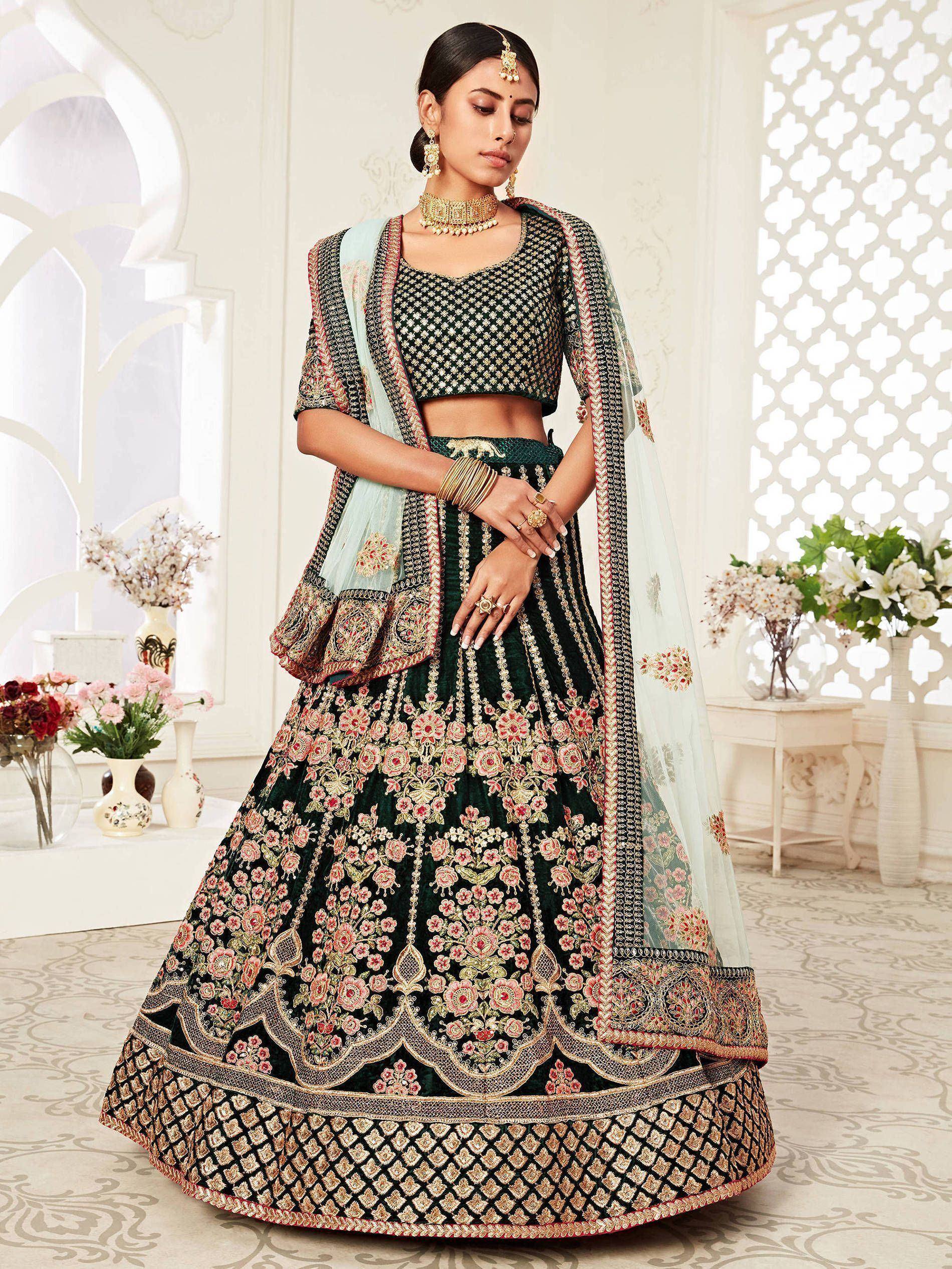 Elegant green embroidered lehenga choli with floral designs and matching dupatta for Indian ethnic wear