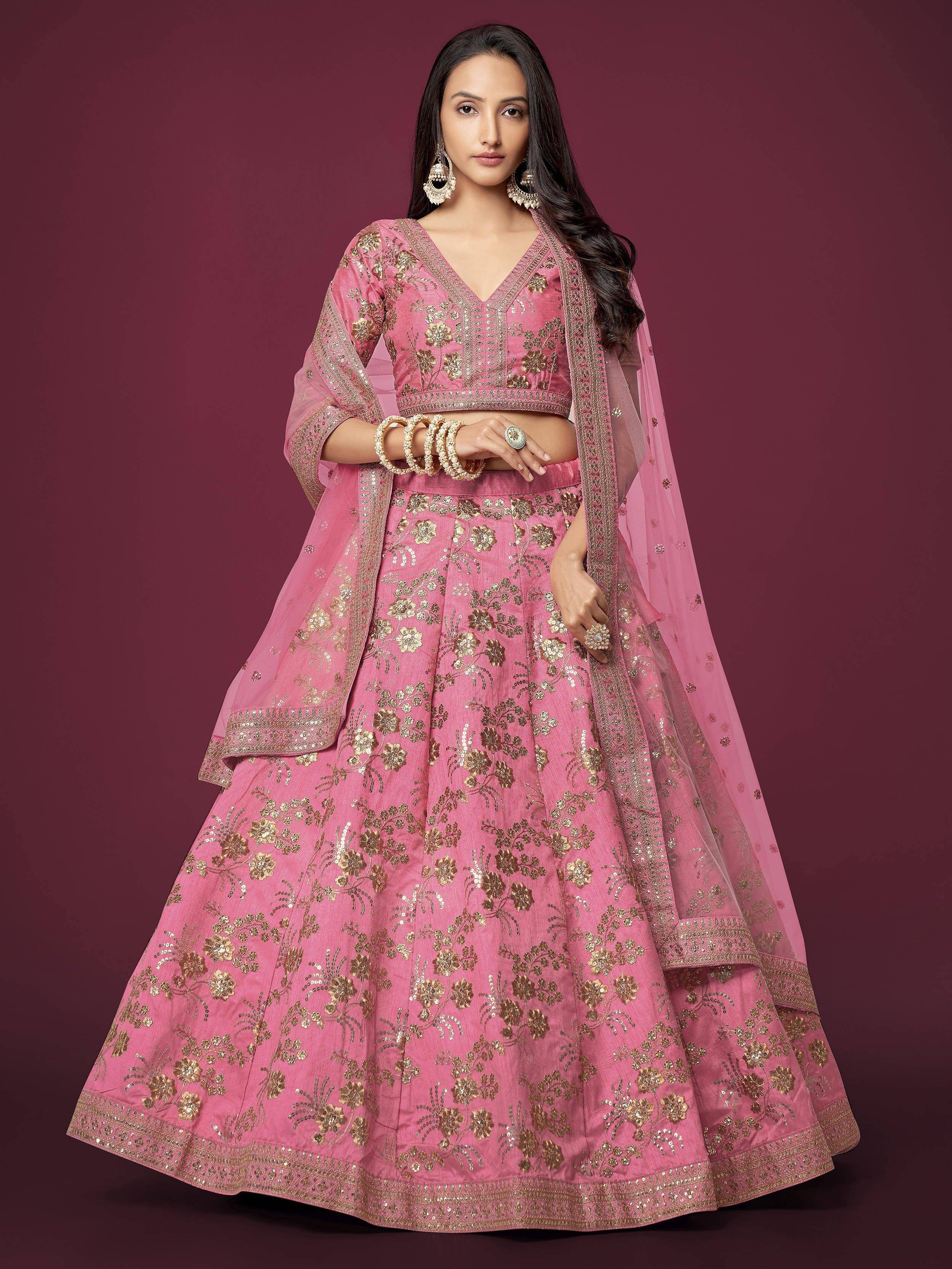 Pink designer lehenga choli with gold floral embroidery and matching dupatta for Indian ethnic wear
