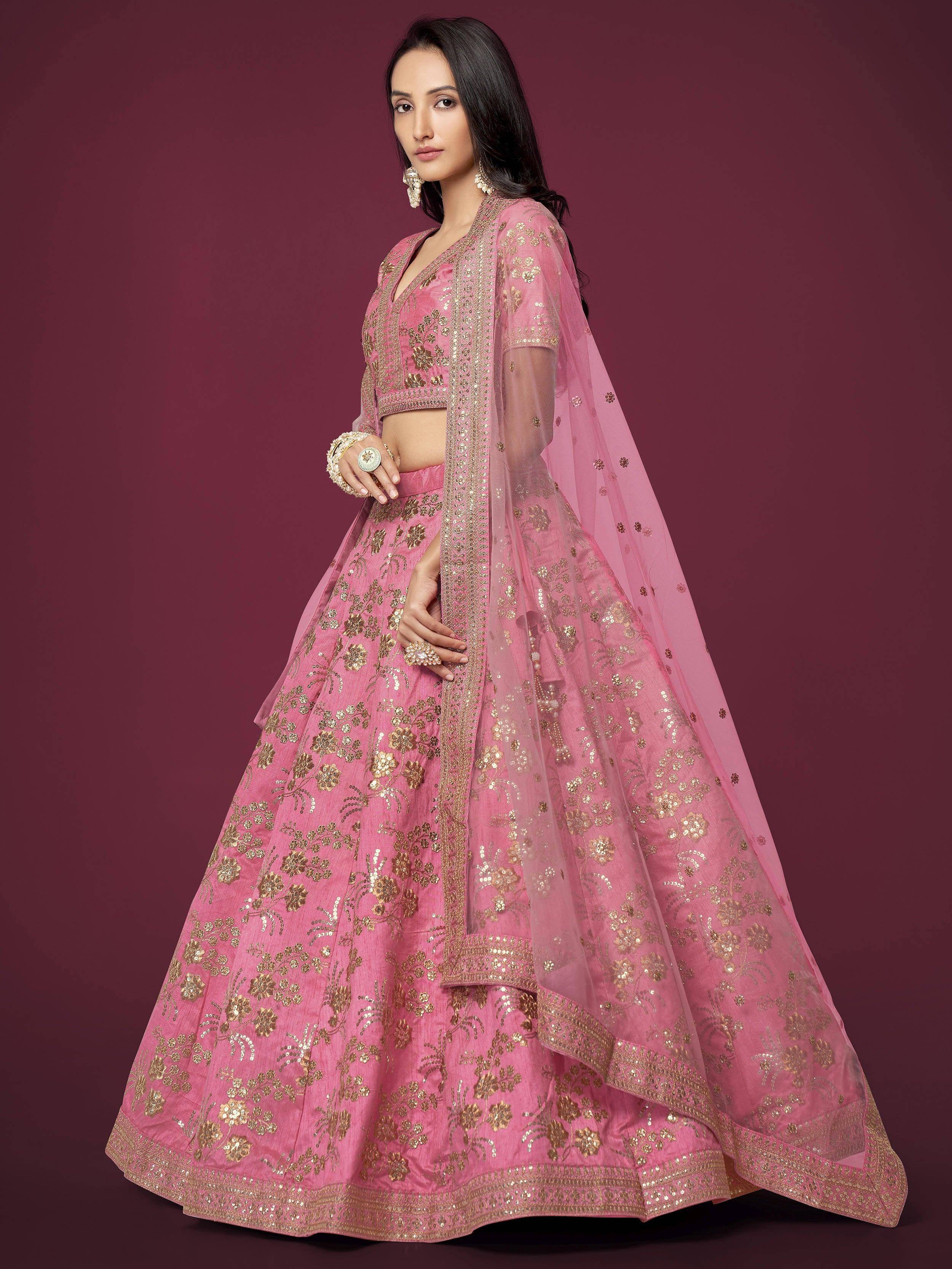Pink designer lehenga choli with gold floral embroidery and sheer dupatta for Indian ethnic wear