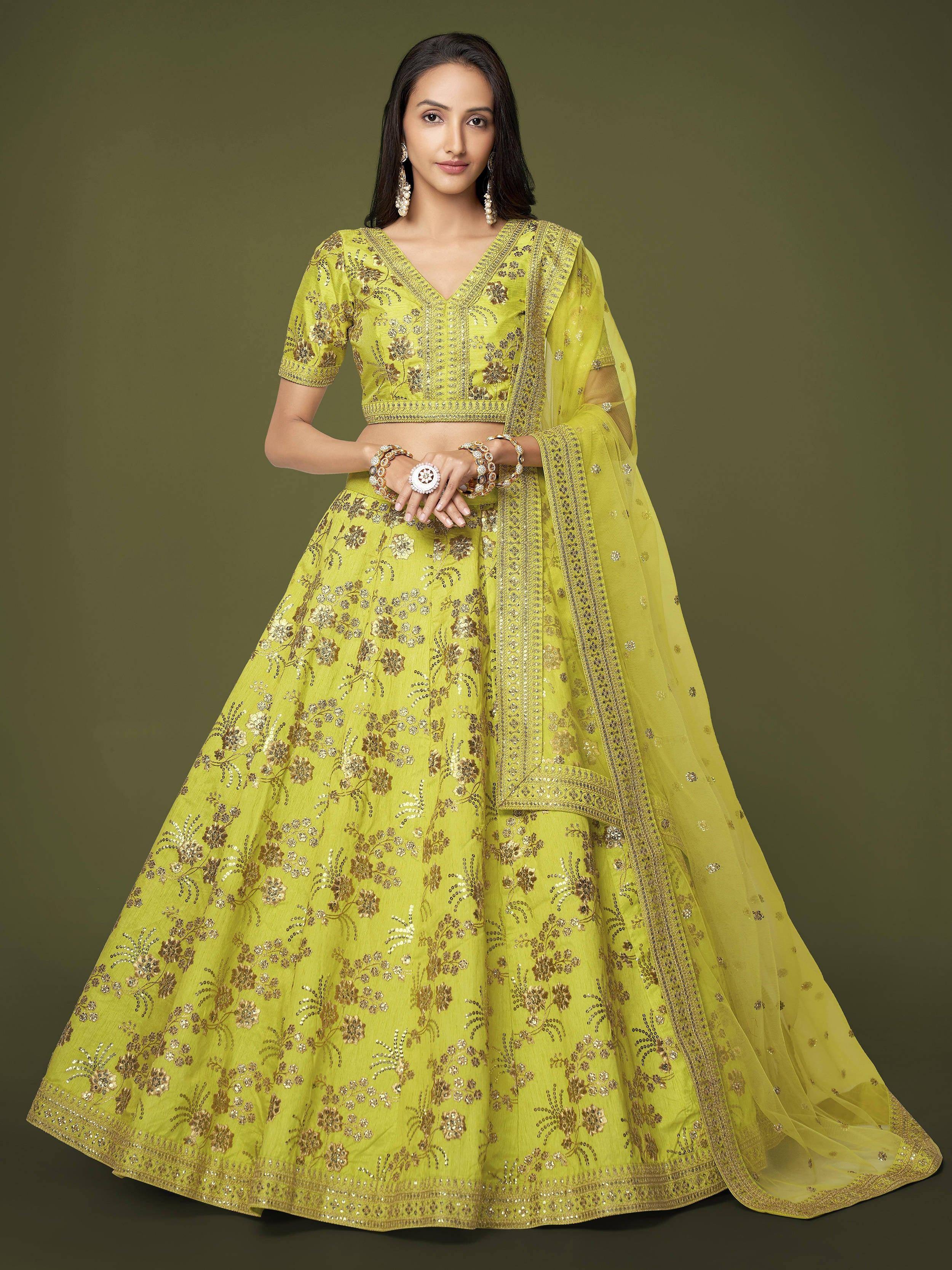 Lime green embroidered lehenga choli with gold floral work and sheer dupatta for Indian ethnic wear