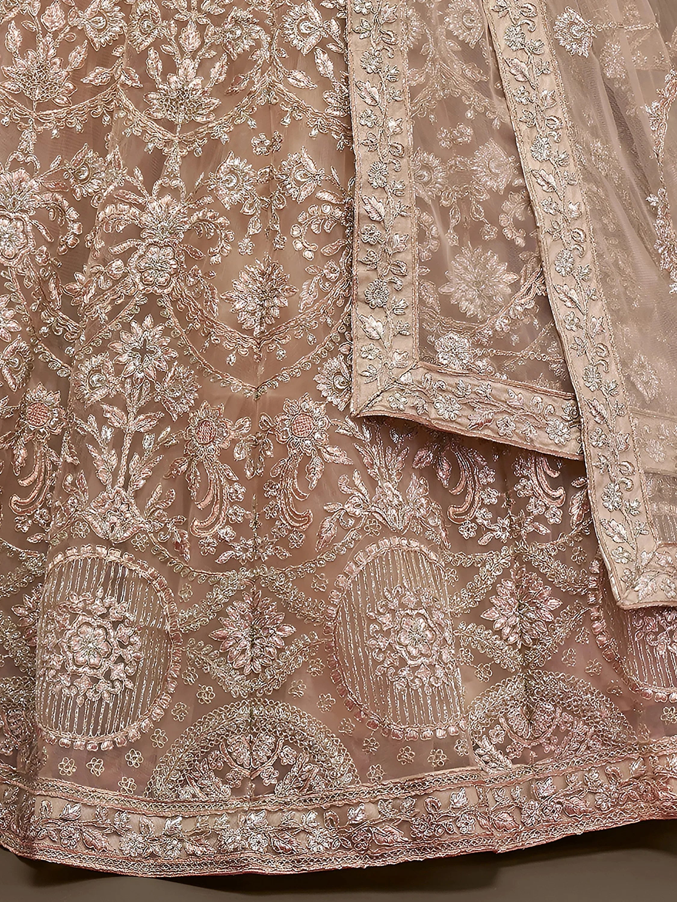 Ravishing Beige Embroidered Soft Net Ceremony Wear Lehenga Choli