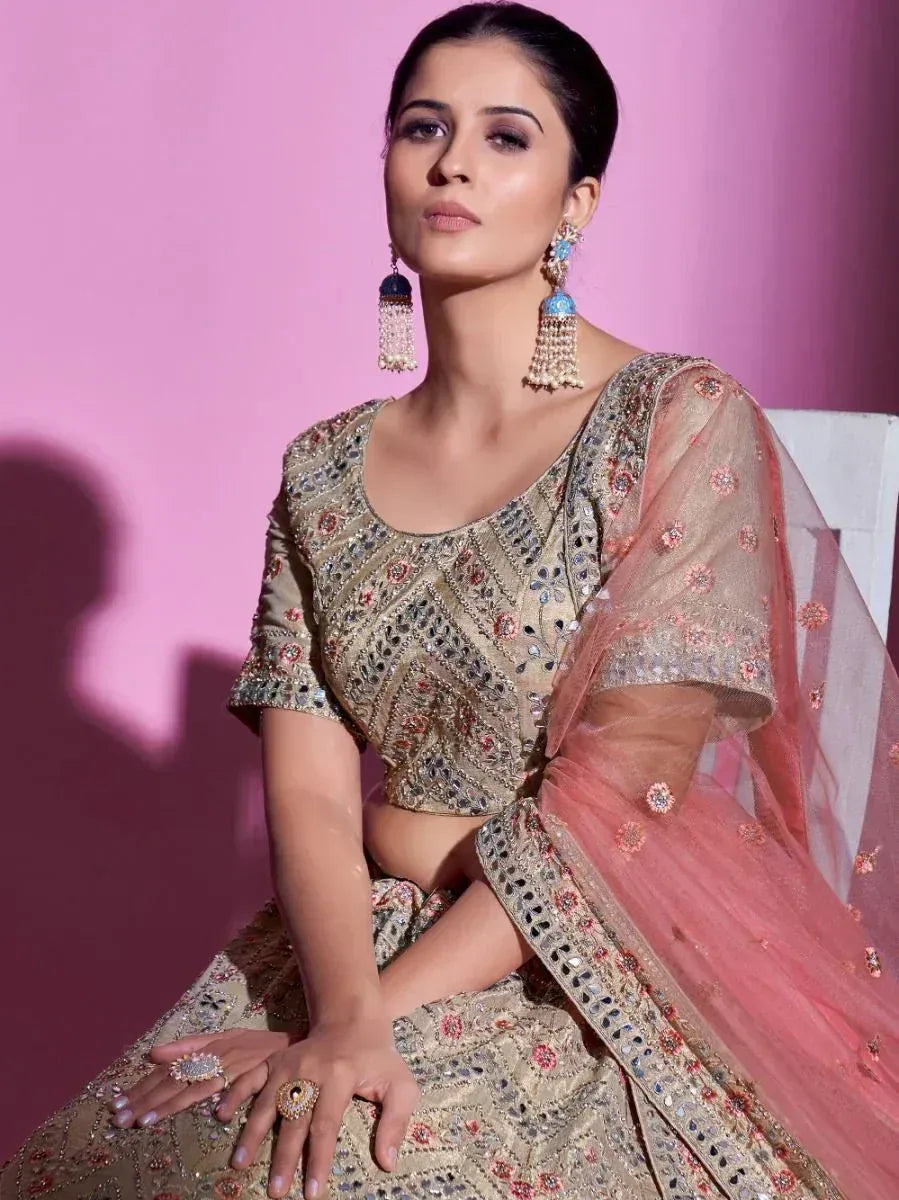 Elegant Indian lehenga choli with intricate embroidery and pink dupatta, perfect for weddings and festive occasions.