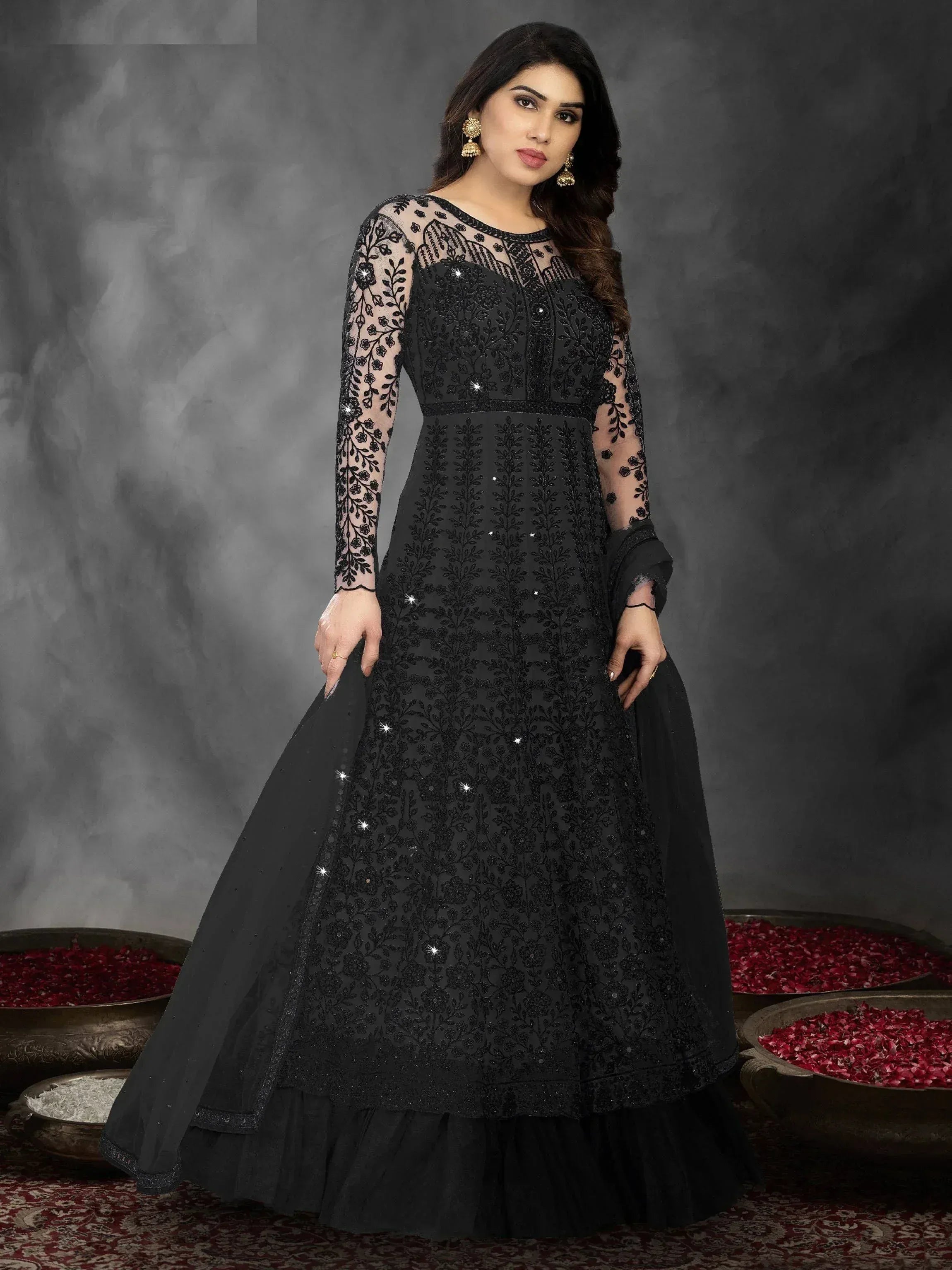 Black embroidered ethnic gown with sheer sleeves and floral detailing for festive occasions