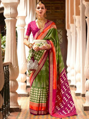 Gorgeous Green & Rani Printed Patola Silk Reception Wear Saree With Blouse