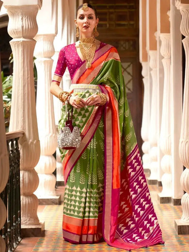 Gorgeous Green & Rani Printed Patola Silk Reception Wear Saree With Blouse