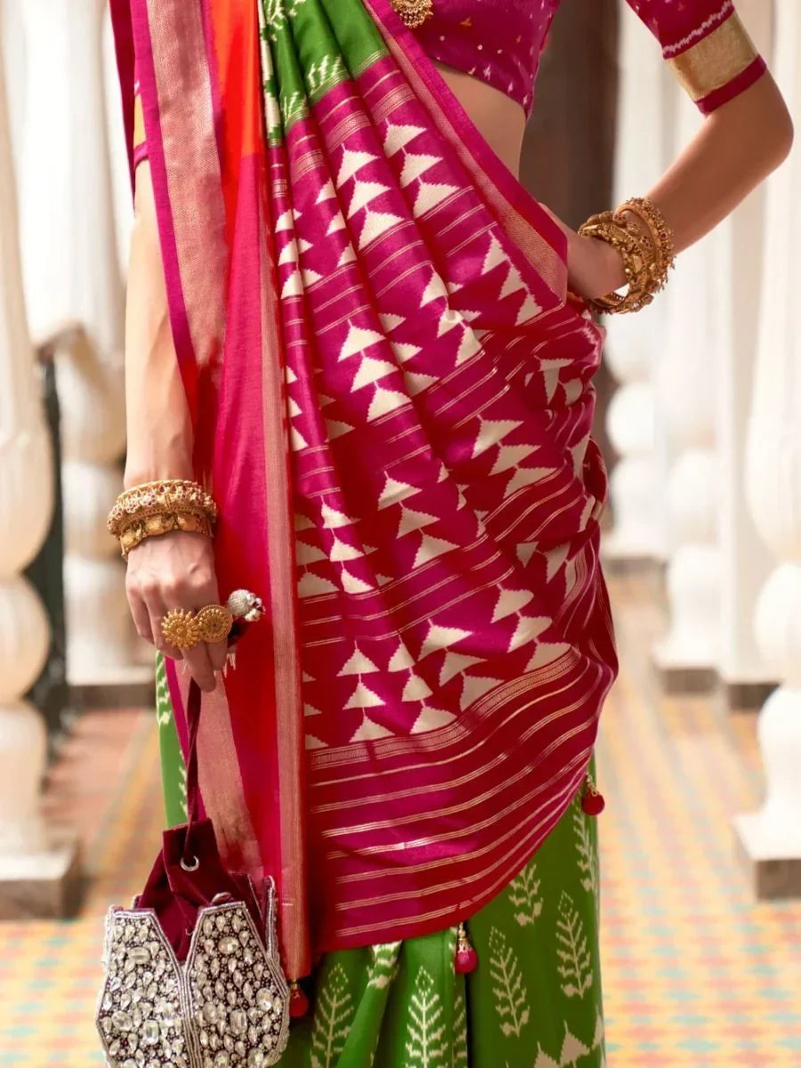 Gorgeous Green & Rani Printed Patola Silk Reception Wear Saree With Blouse