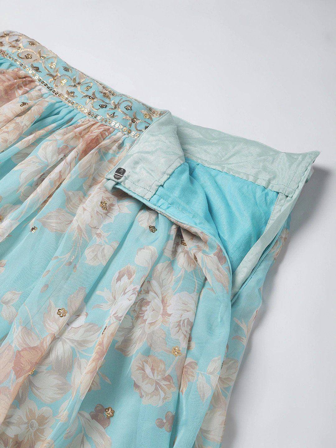 Light blue floral lehenga with gold embroidery and sheer overlay, ethnic wear detail