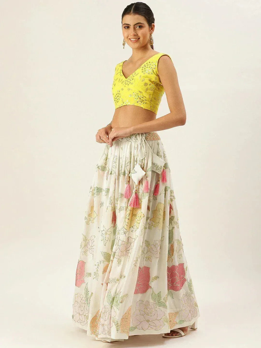 Yellow embroidered crop top with floral print lehenga skirt, Indian ethnic wear for women
