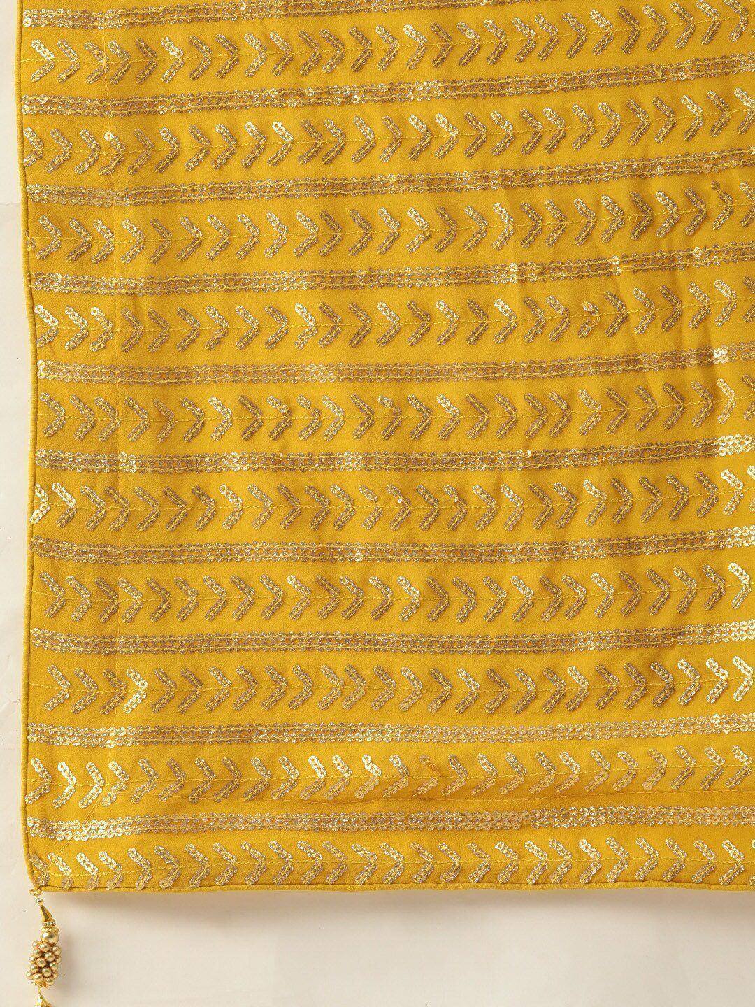 Yellow ethnic fabric with gold arrow embroidery and tassel, ideal for designer lehenga or saree