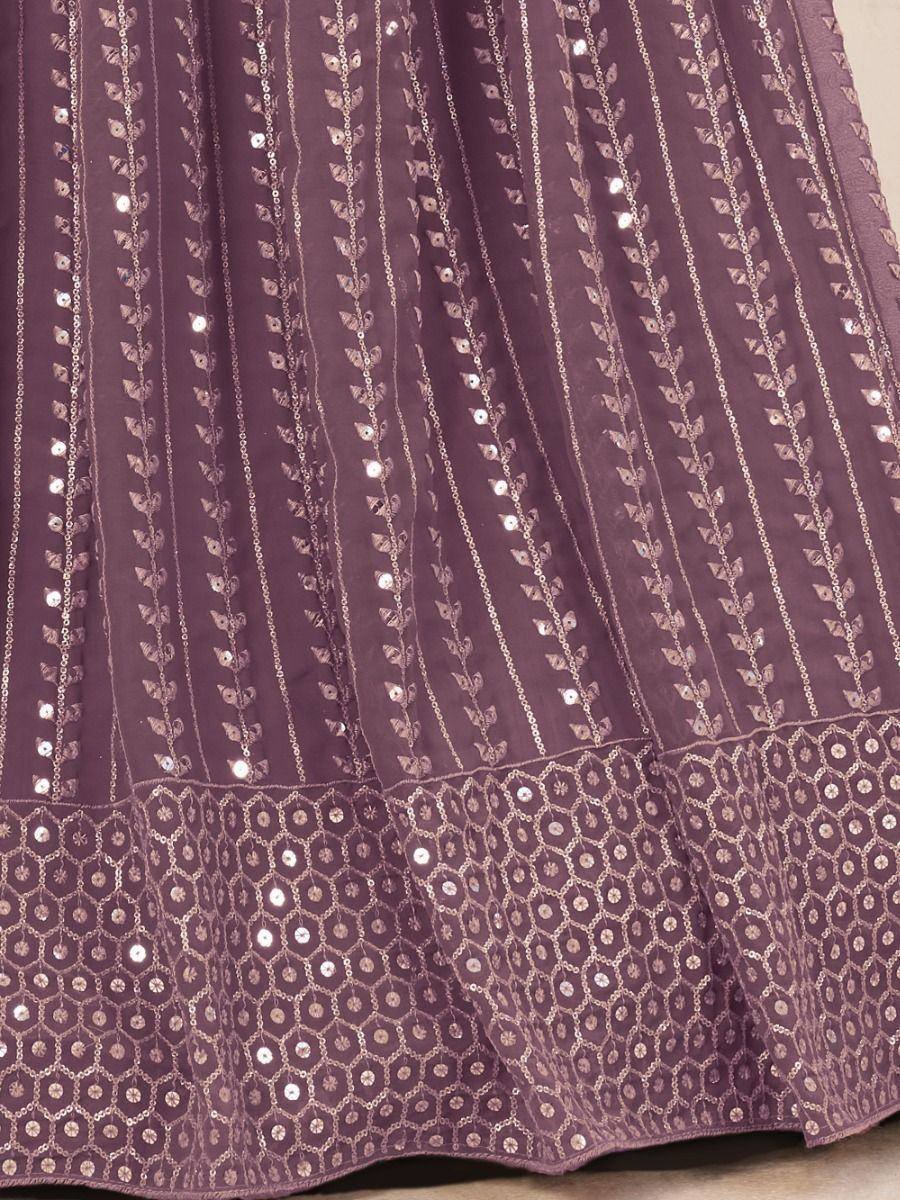 Purple ethnic lehenga skirt with sequin embroidery and floral patterns, ideal for Indian weddings and festivals