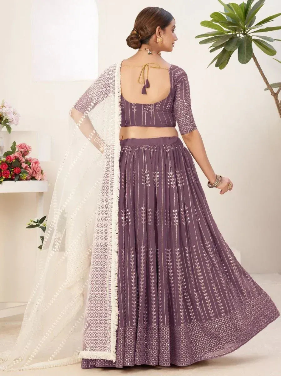 Purple embroidered lehenga choli with white dupatta, perfect for Indian ethnic occasions