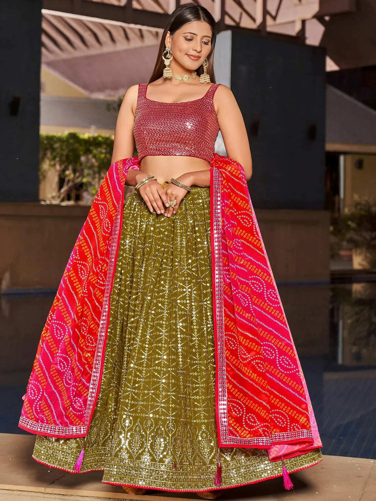 Olive green sequin lehenga choli with red dupatta, perfect for Indian ethnic wear and festive occasions.