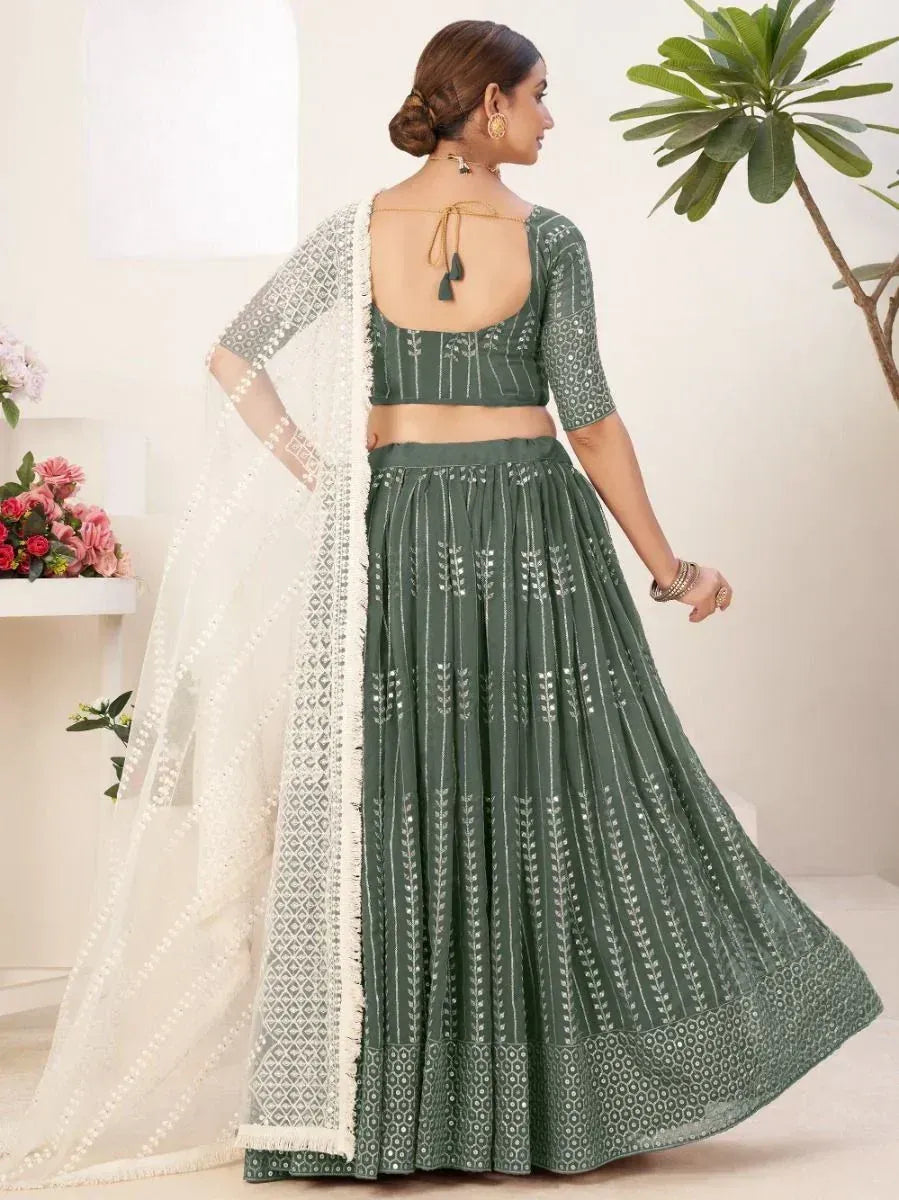 Green embroidered lehenga choli with white dupatta, back view, ethnic wear for women
