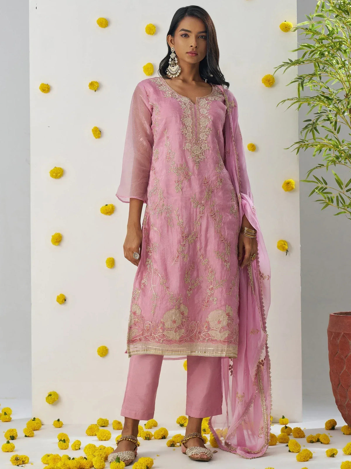 Pink embroidered salwar kameez with gold floral work, matching dupatta, and palazzo pants for ethnic wear