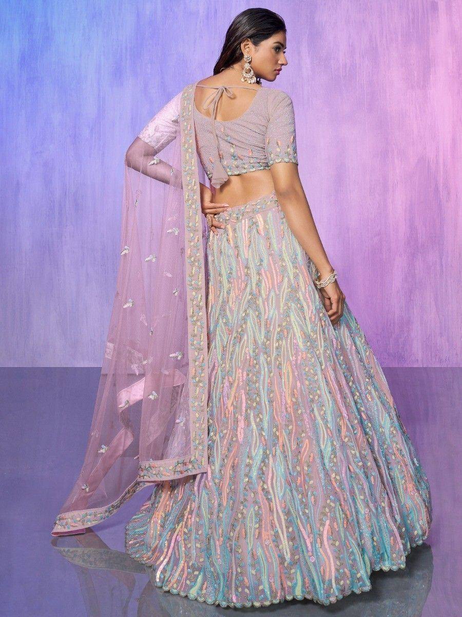 Pastel embroidered lehenga choli with sheer dupatta, perfect for Indian weddings and festive occasions