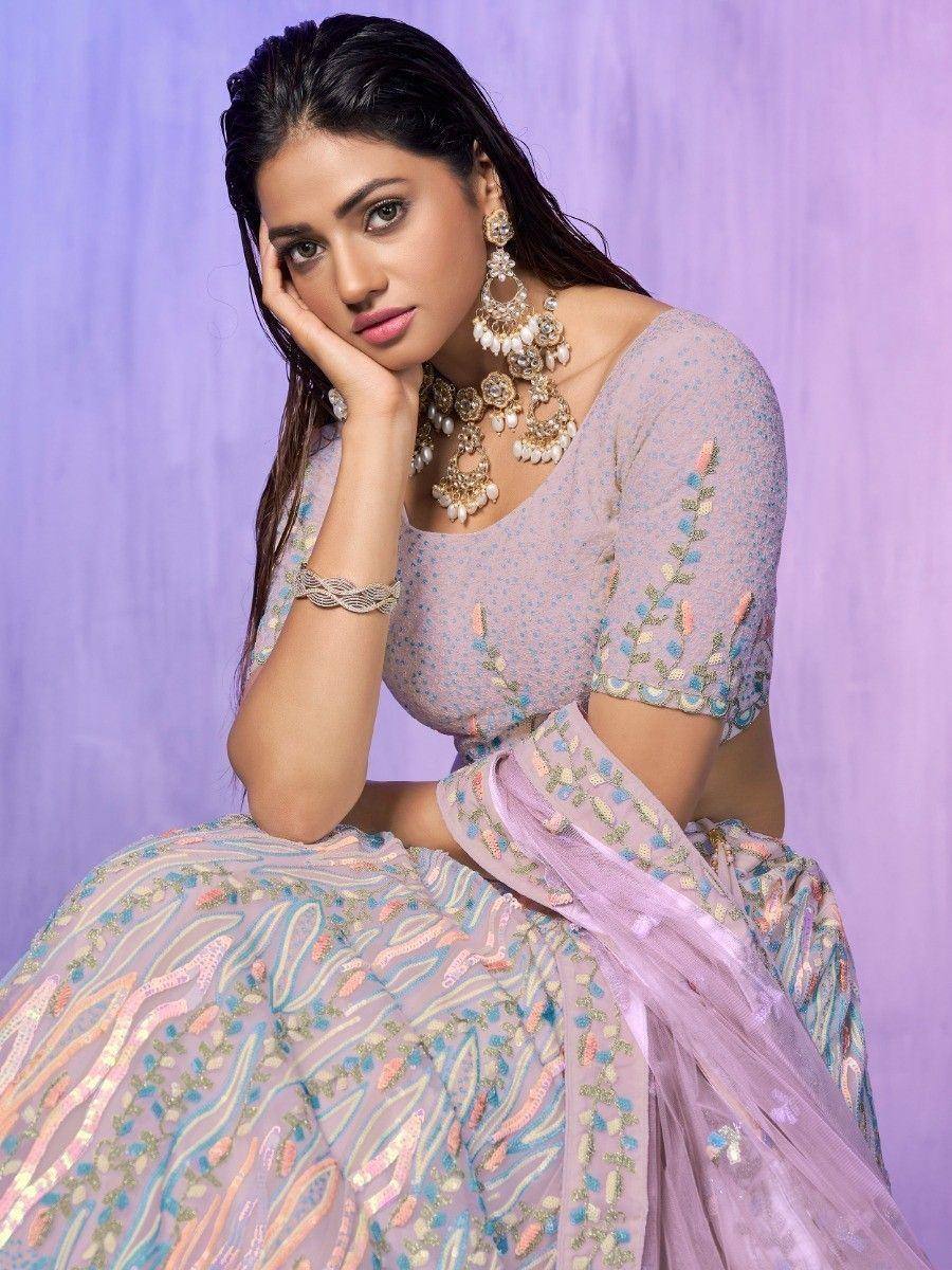 Elegant lavender lehenga choli with floral embroidery, perfect for Indian ethnic wear occasions
