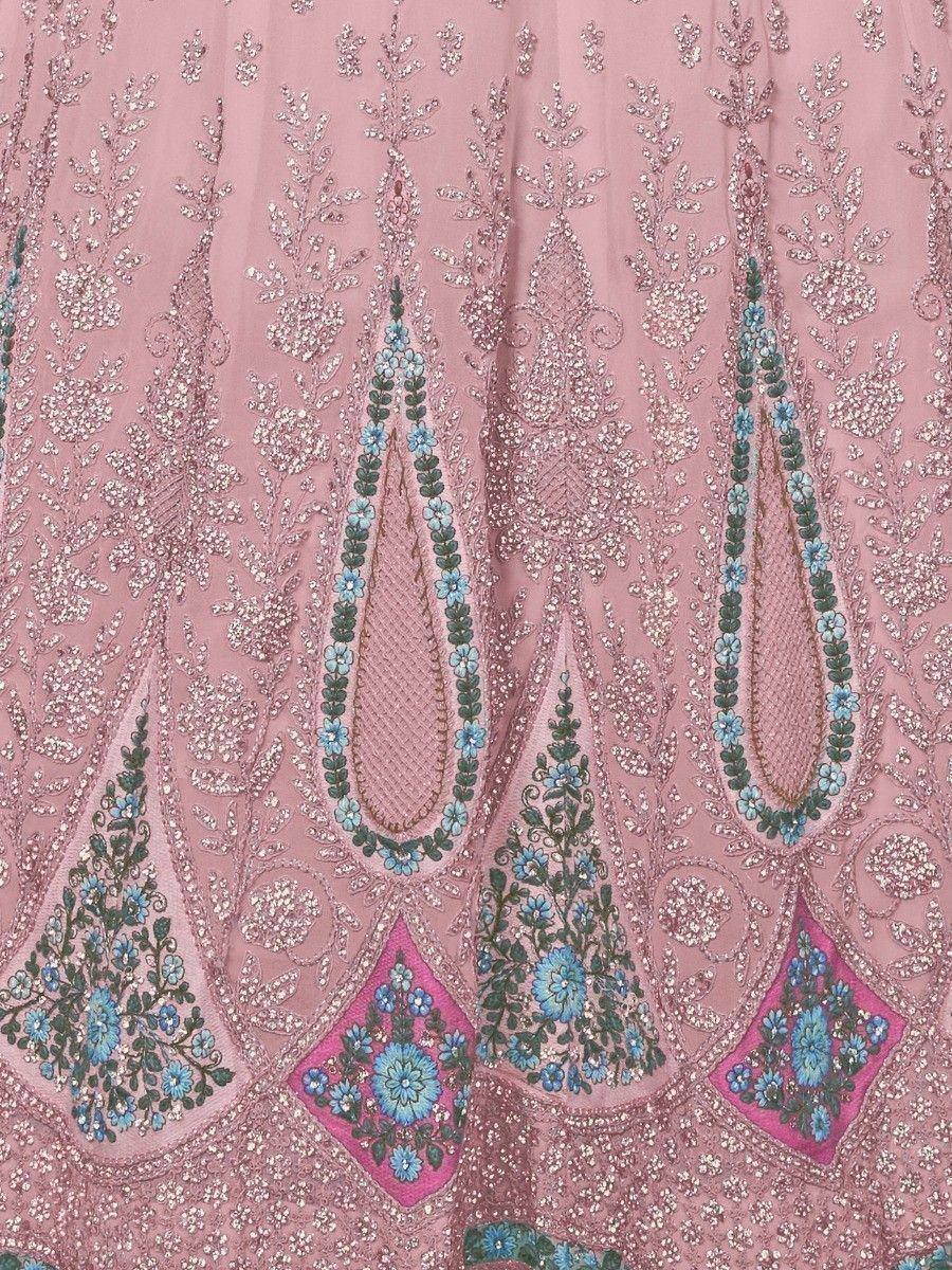 Pink ethnic lehenga with blue floral embroidery and sequin detailing