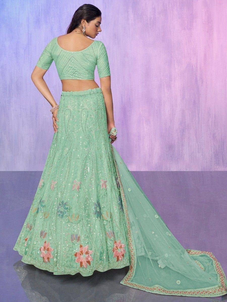 Mint green embroidered lehenga choli with floral motifs and sheer dupatta, perfect for Indian ethnic occasions