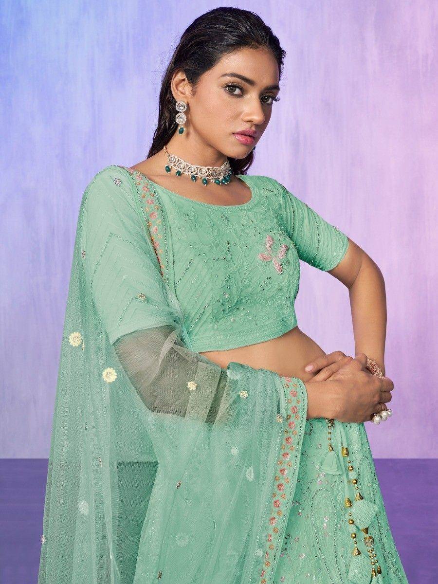 Mint green embroidered lehenga choli with sheer dupatta, perfect for Indian ethnic occasions