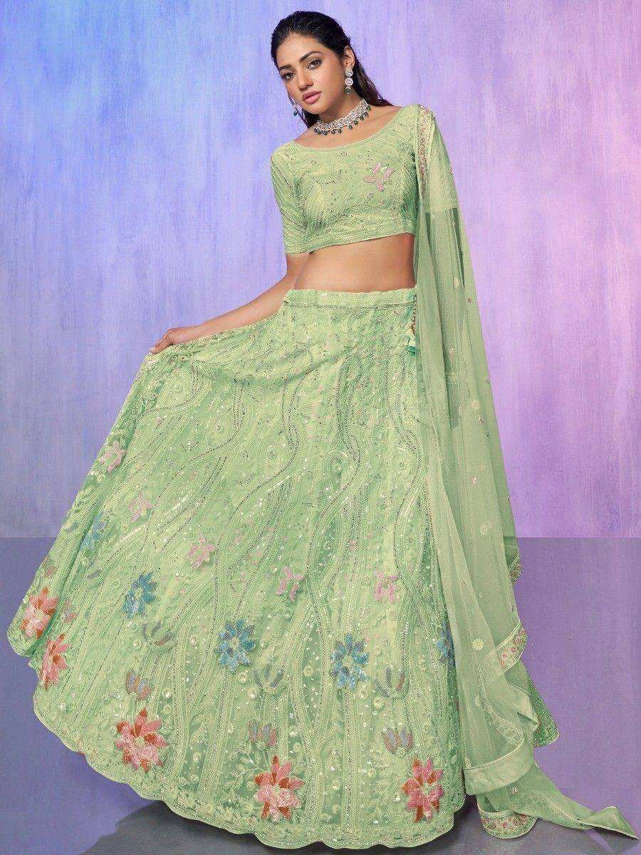 Mint green embroidered lehenga choli with floral motifs and sheer dupatta, perfect for Indian ethnic occasions