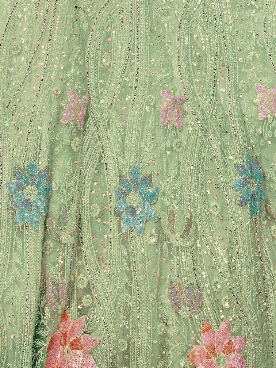 Mint green ethnic gown with floral sequin embroidery and delicate lace detailing