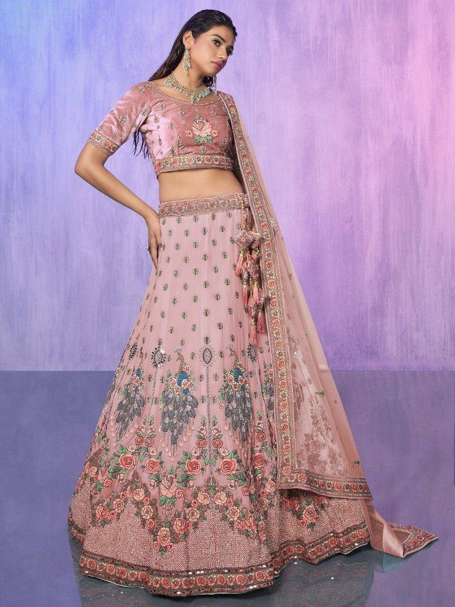 Pink floral embroidered lehenga choli with peacock motifs, perfect for Indian weddings and festive occasions.