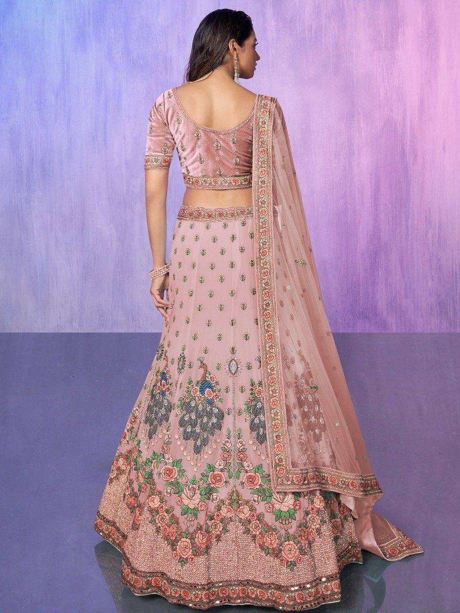 Pink embroidered lehenga choli with peacock and floral motifs, perfect for Indian ethnic wear occasions