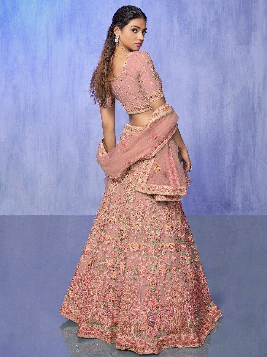 Pink embroidered lehenga choli with floral motifs, perfect for Indian ethnic wear and weddings