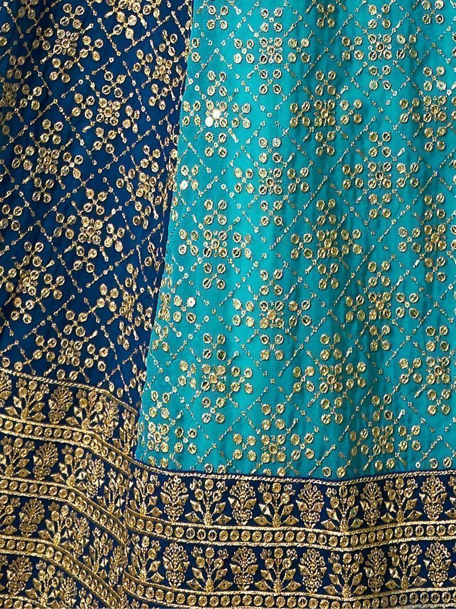 Blue and teal ethnic lehenga with gold embroidery and mirror work details