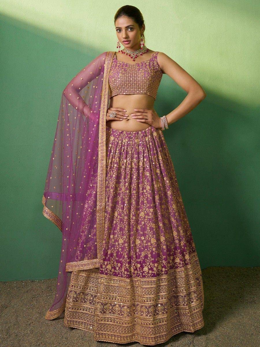 Purple and gold embroidered lehenga choli with sheer dupatta, perfect for Indian weddings and festive occasions