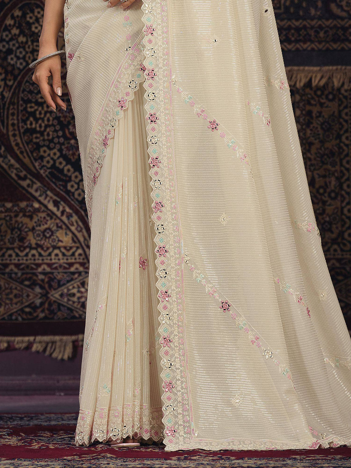 Cream embroidered saree with floral mirror work and sequins, perfect for Indian ethnic wear occasions