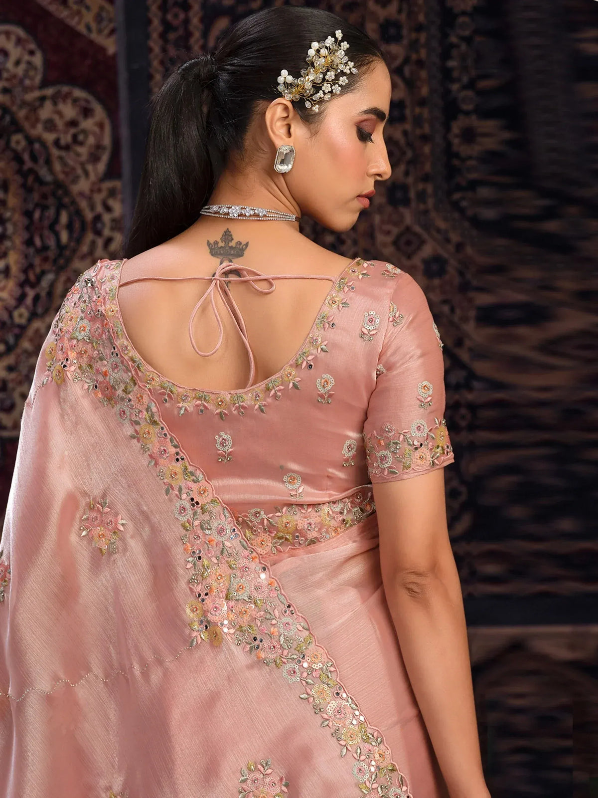 Pink floral embroidered saree with back tie detail, perfect for Indian ethnic wear occasions