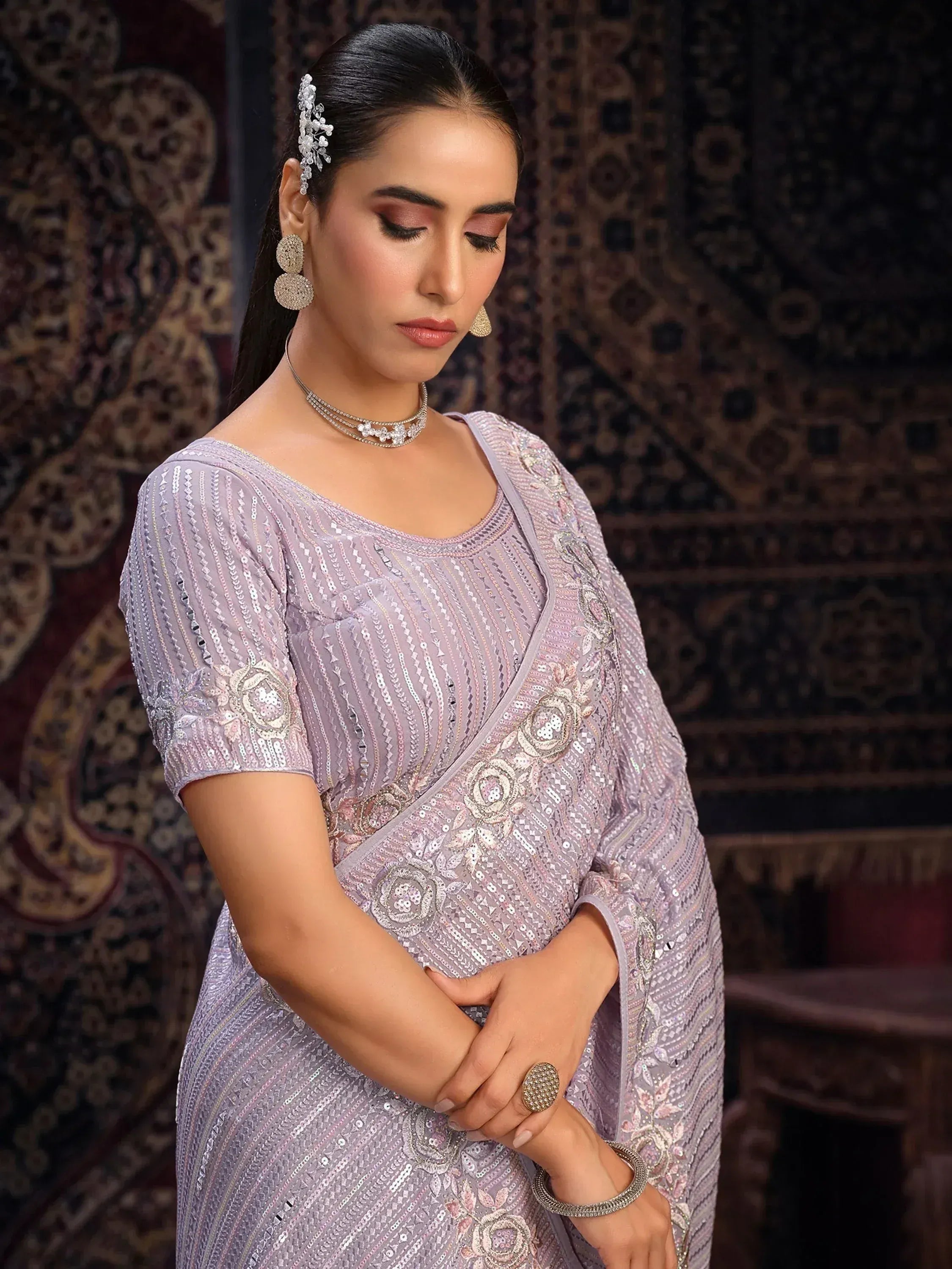 Elegant lavender designer saree with sequin embroidery, perfect for Indian ethnic wear occasions