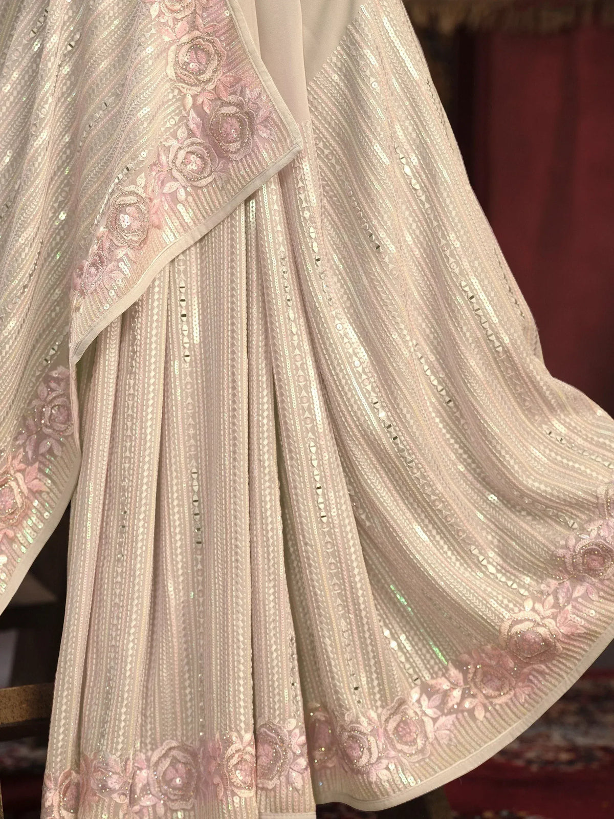 Elegant blush pink lehenga with floral embroidery and sequin detailing for Indian ethnic wear