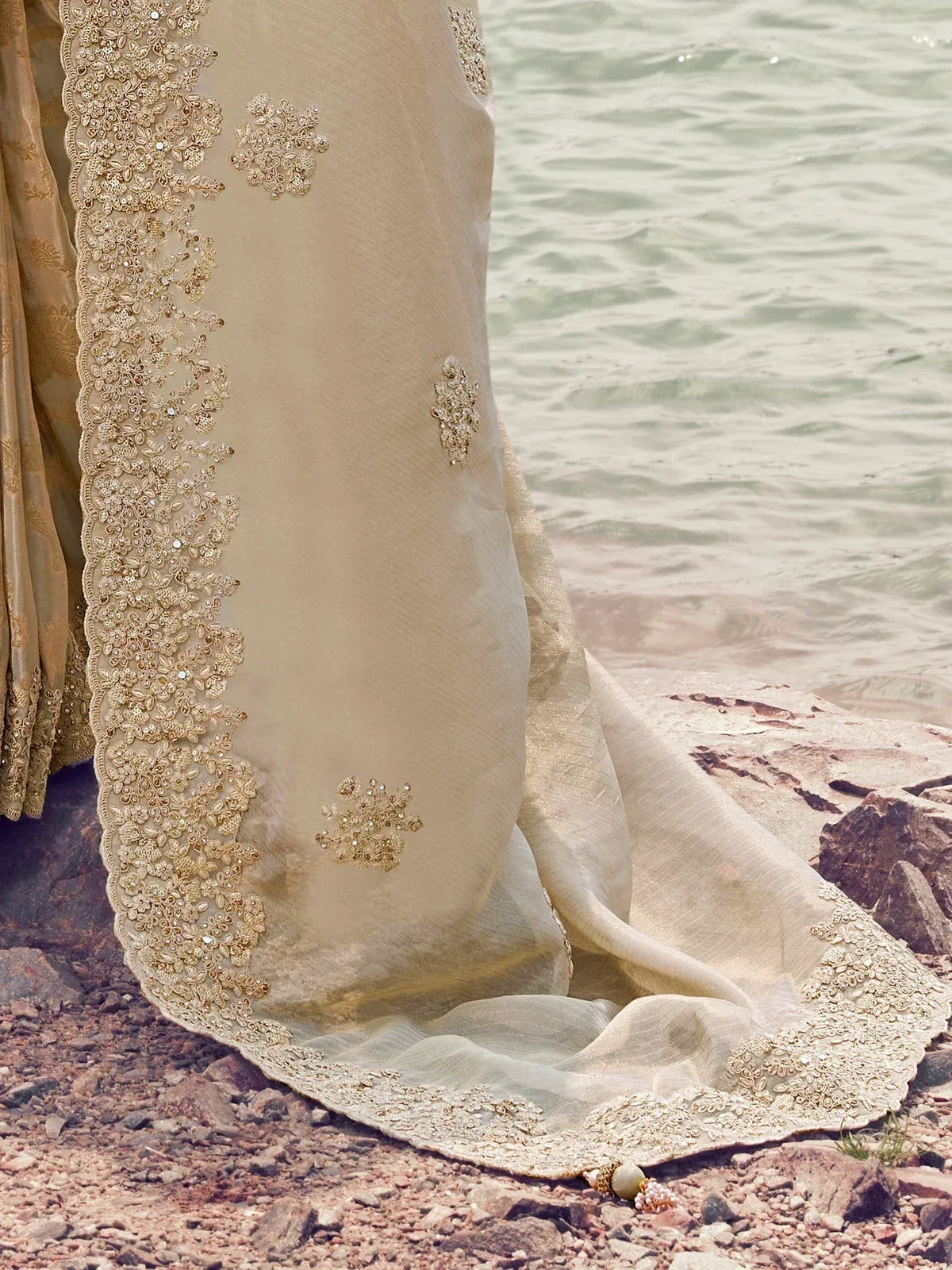 Beige embroidered lehenga with gold floral detailing, perfect for Indian ethnic wear occasions