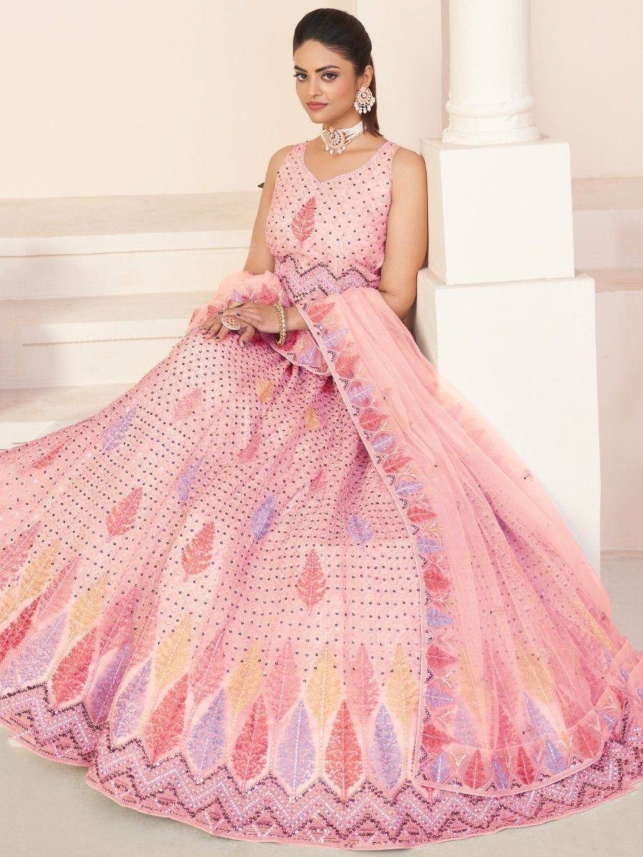 Pink embroidered lehenga choli with feather motifs, perfect for Indian ethnic wear occasions