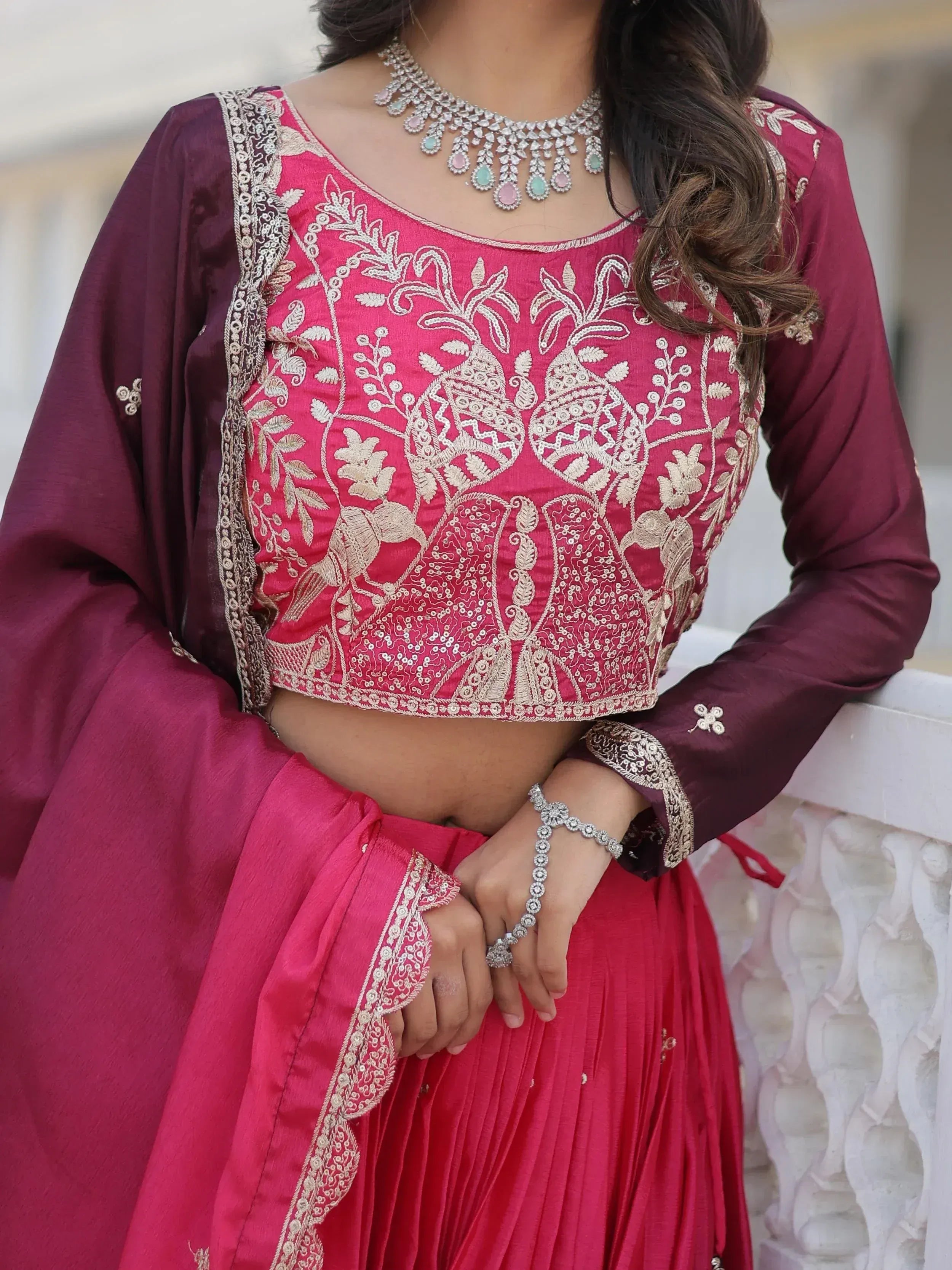 Pink embroidered lehenga choli with gold detailing and matching dupatta, perfect for Indian ethnic wear occasions