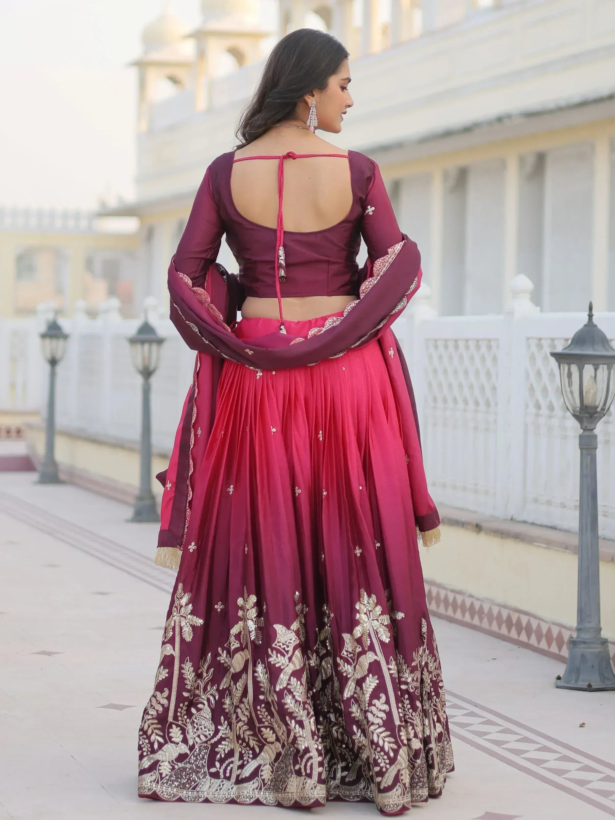 Maroon lehenga choli with gold embroidery, back view, ethnic Indian wear for weddings and festivals