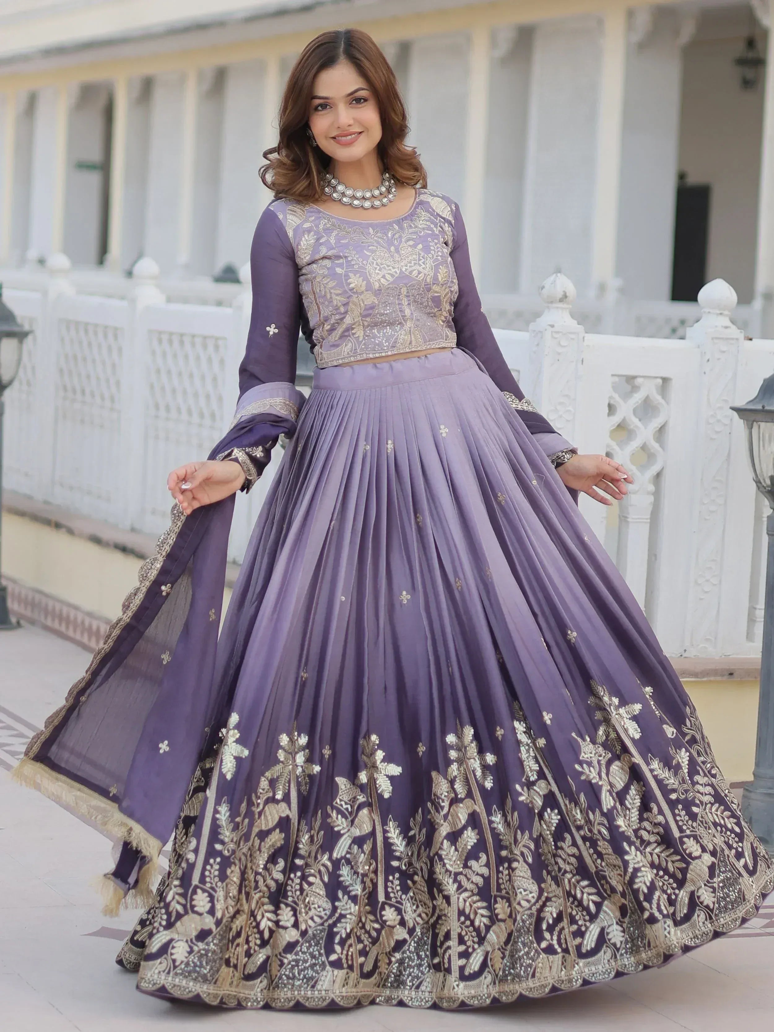 Purple embroidered lehenga choli with gold floral work, perfect for Indian ethnic wear occasions