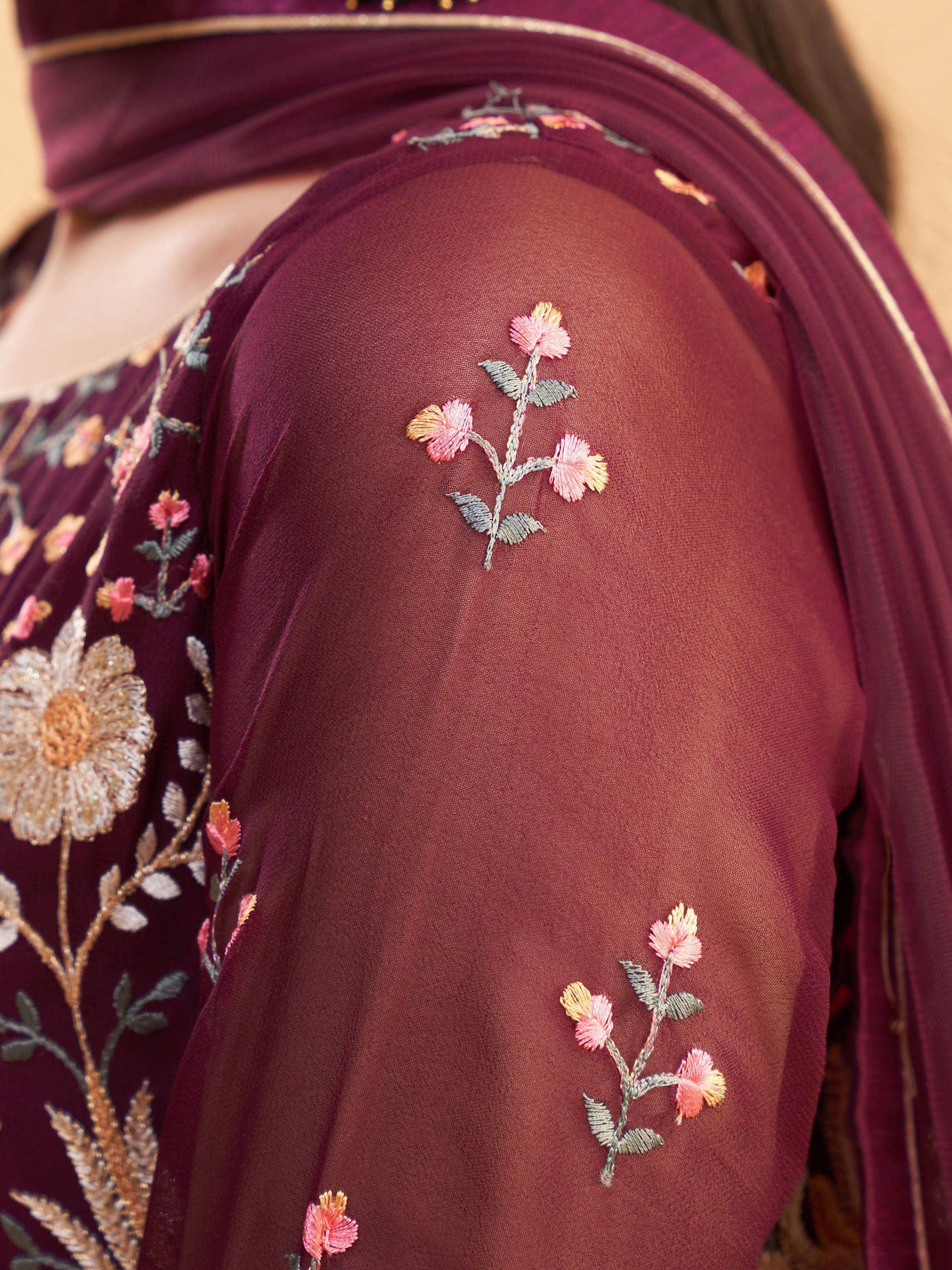 Purple ethnic wear with floral embroidery, perfect for Indian occasions and festive events.