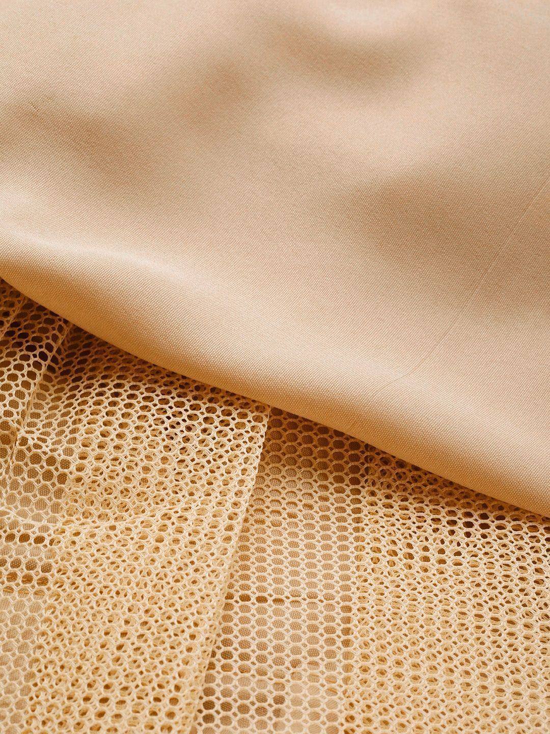 Beige ethnic gown fabric with solid and lace layers, perfect for designer Indian wear