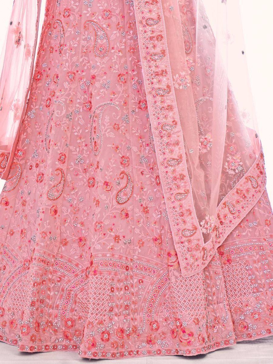 Pink embroidered lehenga choli with floral and paisley motifs, perfect for Indian ethnic wear