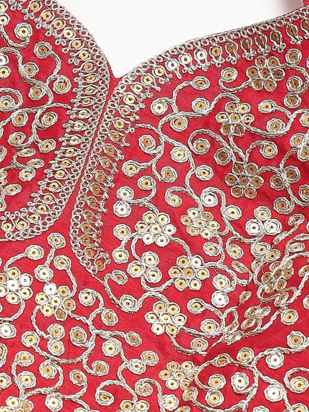 Red designer lehenga choli with intricate gold and silver floral embroidery and sequin detailing