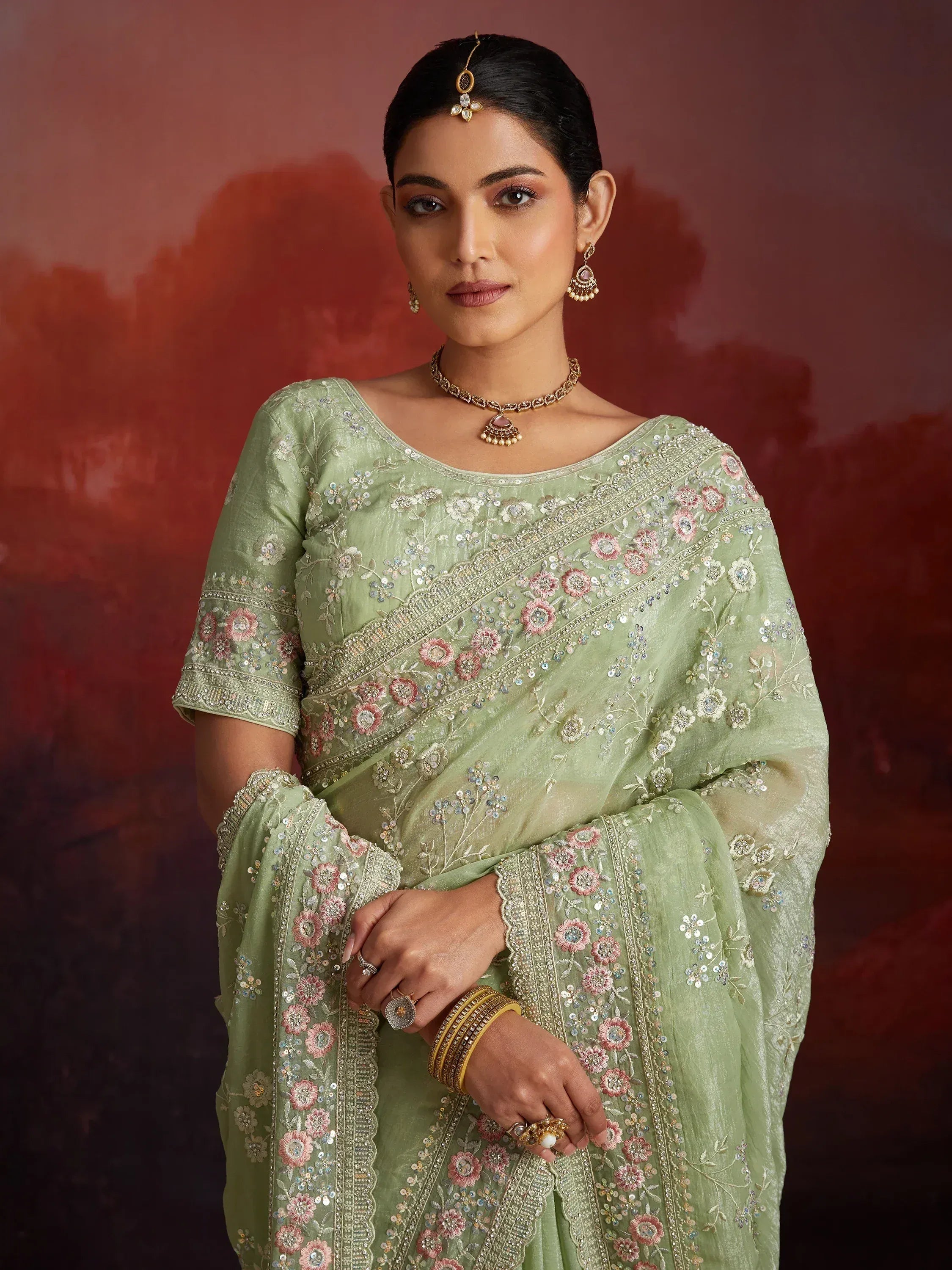 Mint green embroidered saree with floral sequin work, perfect for Indian ethnic occasions