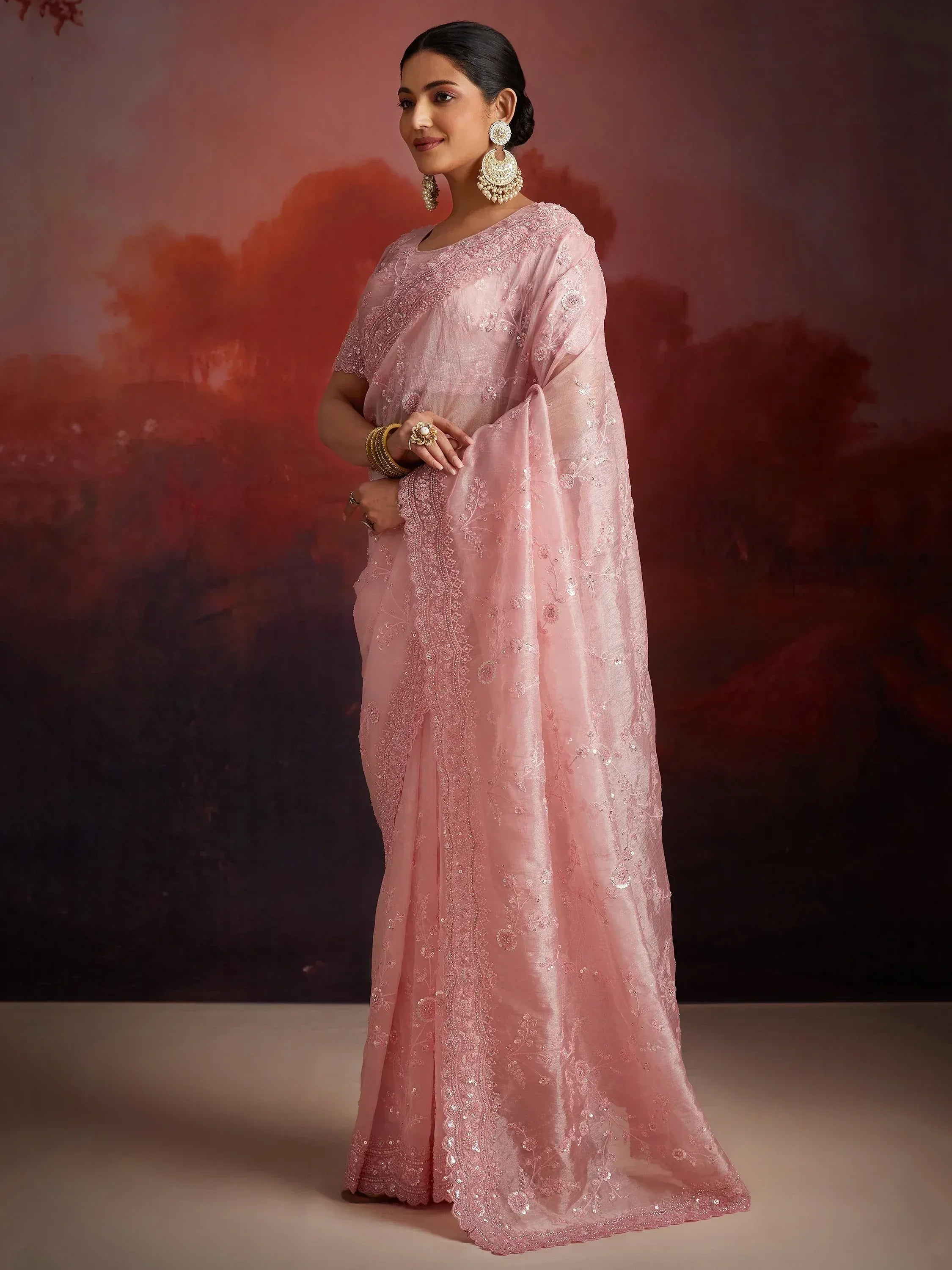 Pink embroidered saree with sequin work, perfect for Indian ethnic occasions and festive wear.